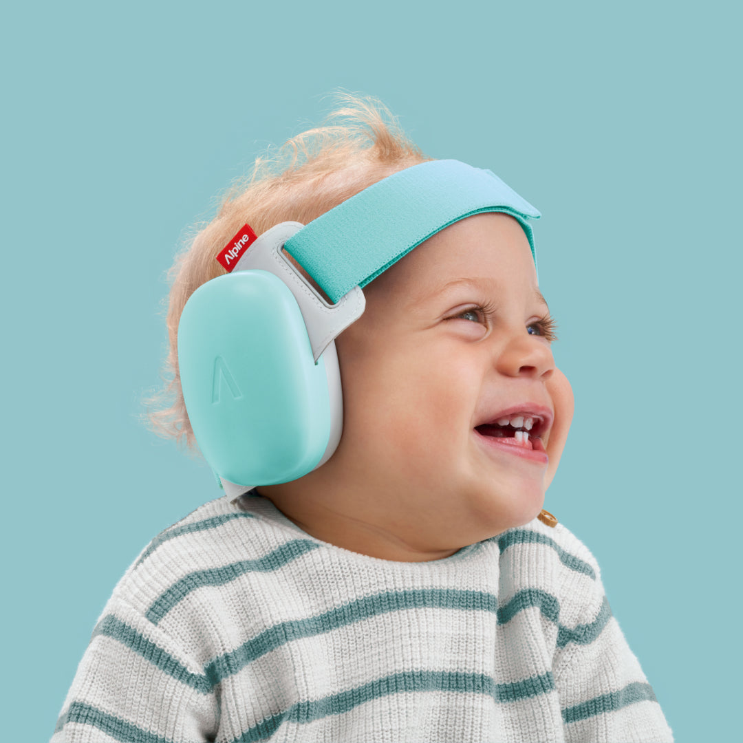 Baby wearing muffy baby in fresh-aqua