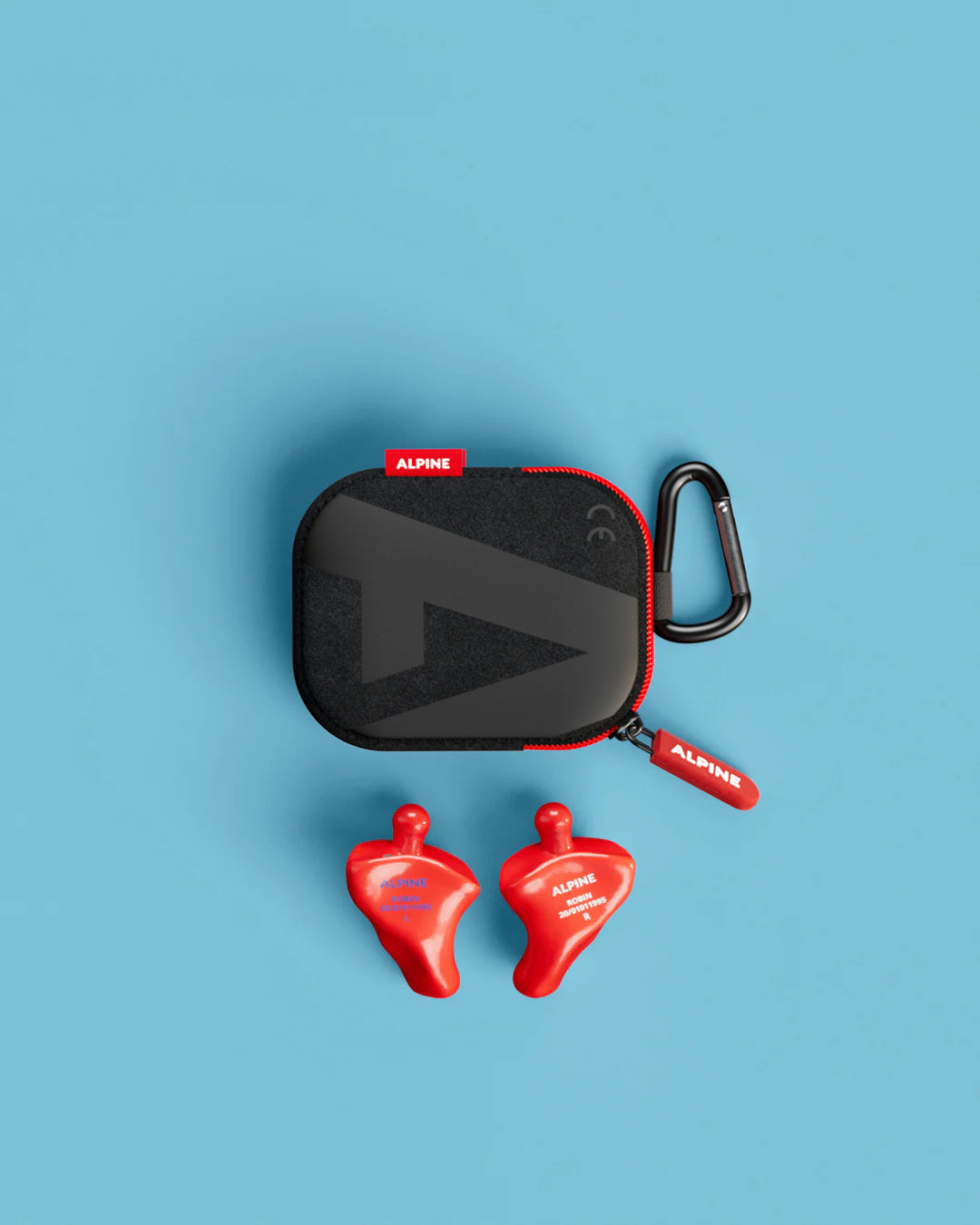 Alpine PartyPlug Custom Red earplugs with black carrying case, top view