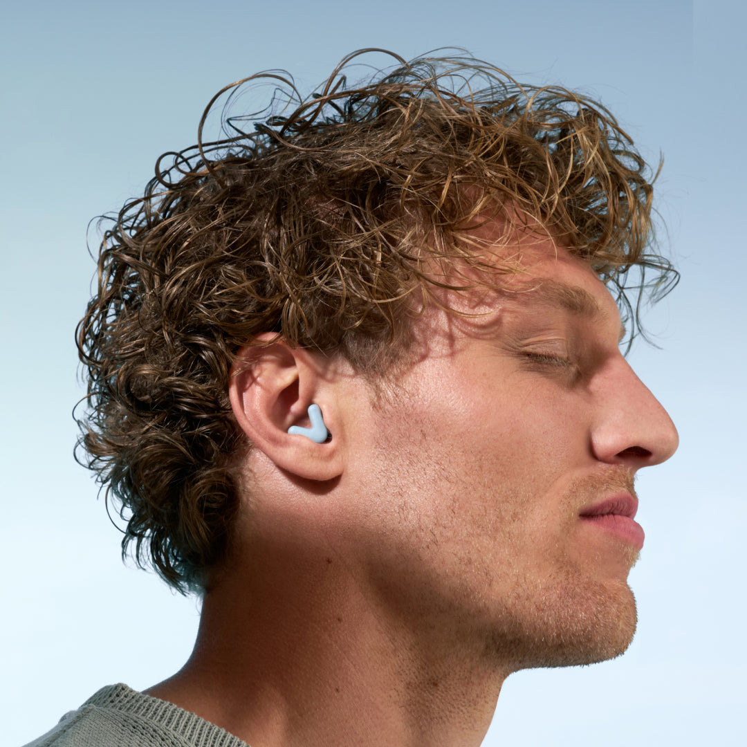 Guy wearing a blue Alpine Silence