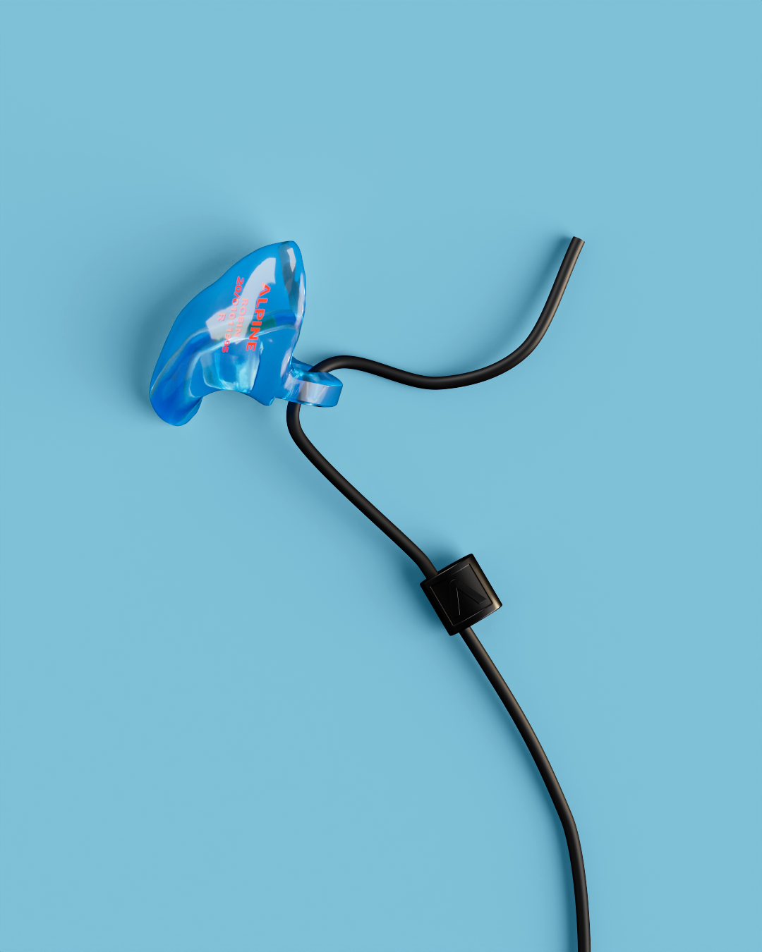 Close-up of a single Alpine WorkSafe Custom Transparent Blue earplug attached to a black cord 