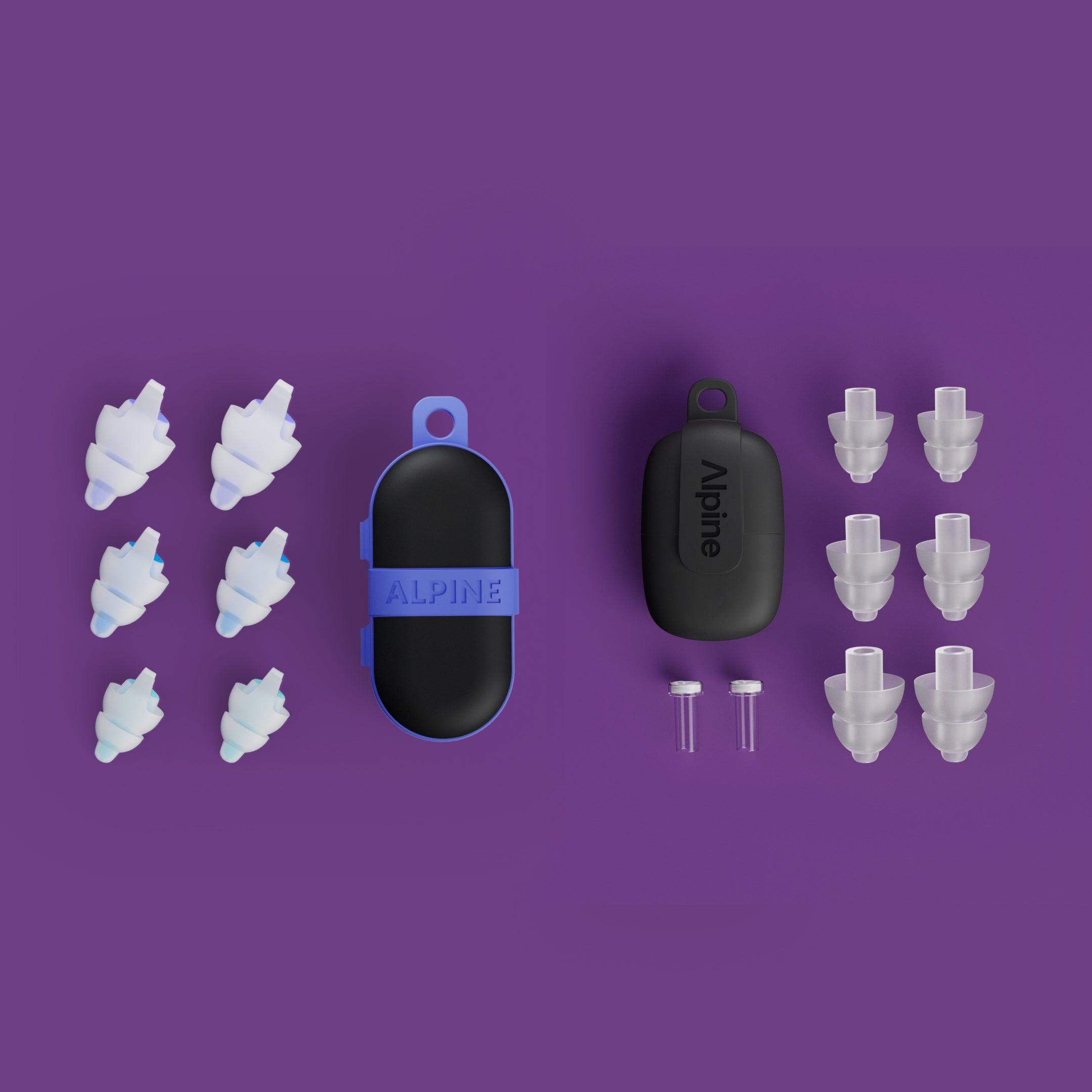 Alpine SleepDeep and Alpine PartyPlug Pro earplugs with cases, spare ear tips and accessories laid out on a purple background 