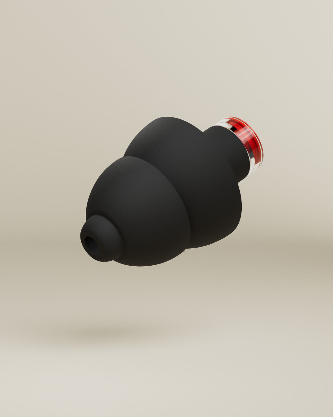 Alpine Formula 1® earplug, 3D render of a single black earplug with red filter on a beige background 