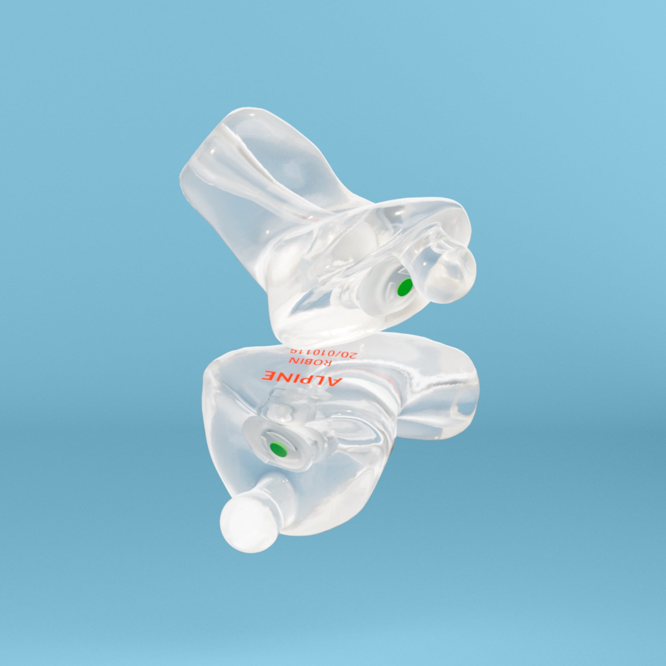 Pair of Alpine MotoSafe Custom Transparent earplugs with filters, 3D render 